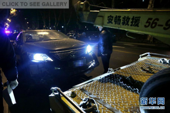 Photo shows the black sedan which intended to crash into the Consulate General of the United States in Shanghai late Thursday, injuring a Chinese armed police guard. (Photo/Xinhua) 