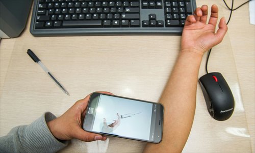 Online consultations offer people in China's less developed areas to get medical opinions from respected specialists anywhere in the country. (Photo: GT/Li Hao)