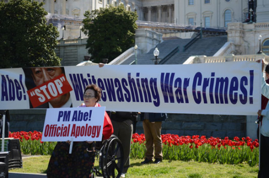 Lee Yoo-soo, who testified to Congress in 2007 about her traumatic experience as one of the thousands of 'comfort women' victims during the invasion of Japan in World War II, appears at the rally organized by the Washington Coalition for Comfort Women Issues (WCCW) in Washington on Tuesday, demanding an official apology. Liu Xiaoxian / For China Daily.