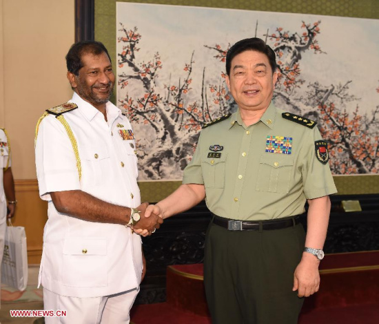 Chinese Defense Minister Chang Wanquan (R) meets with Jayantha Perera, commander of the Sri Lanka navy, in Beijing, capital of China, June 9, 2015. (Xinhua/Gao Jie)