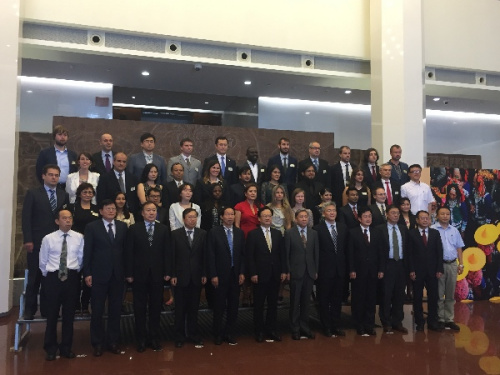 Sinologists participated in the 3rd Visiting Program for Young Sinologists taking a photo at the National Library of China on July 24. (Photo by Ruan Fan/For China Daily)