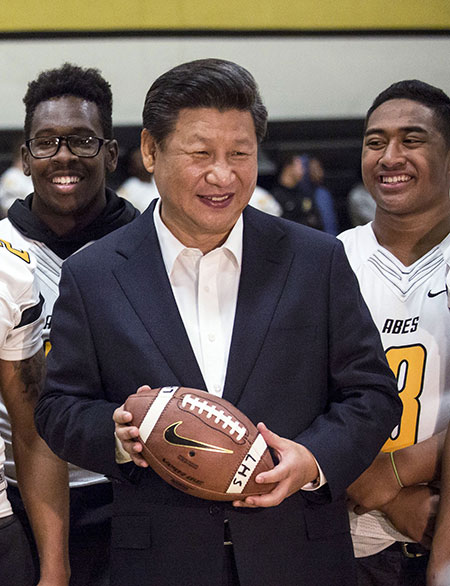 Xi meets Lincoln High students. (Photo/China Daily)