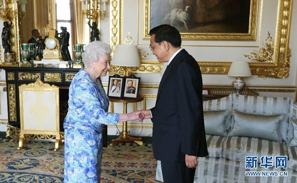 Britain's Queen Elizabeth II receives Premier Li Keqiang at Windsor Castle in southern England on June 17, 2014. (Photo/Xinhua)