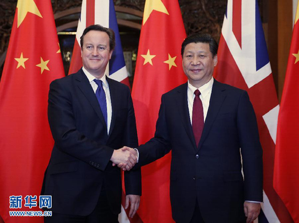 President Xi Jinping meets with UK Prime Minister David Cameron in Beijing, Dec 2, 2013. (Photo/Xinhua)