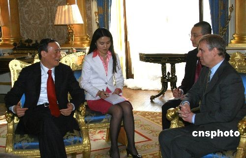 Britain's Prince Andrew in talk with Wang Qishan, then Vice Premier of the State Council, May 11, 2009. (CNS photo)