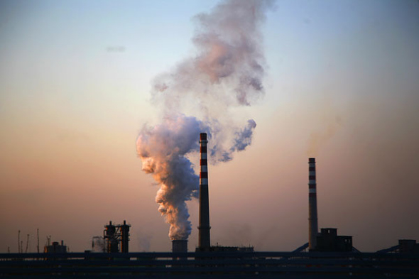 Smoke billows from a factory in Dezhou, Shandong province. (Provided to China Daily)