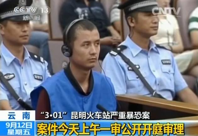 Screen shot from China Central Television's news program shows a suspect of the Kunming train station terrorist attack sitting in the intermediate court of Kunming, the capital city of Southwest China's Yunnan province in this Sept 12, 2014 file photo. (Photo /screen shot from China Central Television)