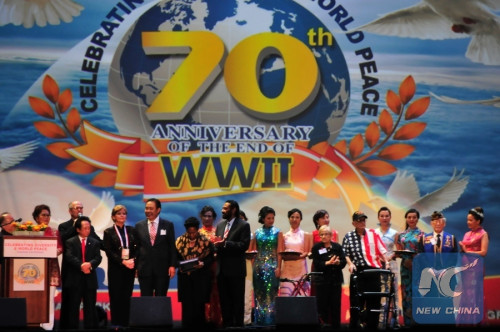 Grand opening ceremony held for Diversity and World Peace event in Houston, the United States, Nov.8, 2015. (Photo: Xinhua/Zhang Yongxing)