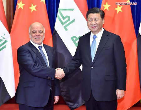 Chinese PresidentXi Jinping(R) meets withIraqi Prime Minister Haider al-Abadi in Beijing, capital of China, Dec. 22, 2015. (Photo: Xinhua/Li Tao)