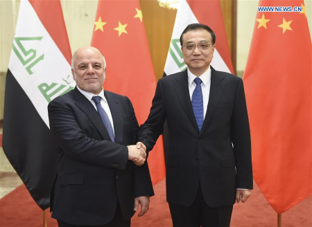 Chinese Premier Li Keqiang (R) holds talks with Iraqi Prime Minister Haider al-Abadi in Beijing, capital of China, Dec. 22, 2015. (Photo: Xinhua/Xie Huanchi)