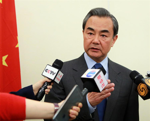 The deployment of the THAAD system by the U.S. goes far beyond the defense needs of the Korean Peninsula and the coverage would mean it will reach deep into the Asian continent, Foreign Minister Wang Yi said. (Photo/Xinhua)