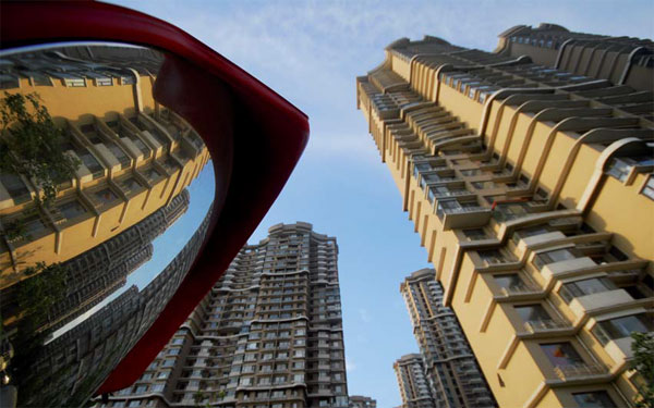 Real estate investment growth fell to 2 percent in the first 10 months of this year, acting as a drag on GDP growth. (Provided to China Daily)