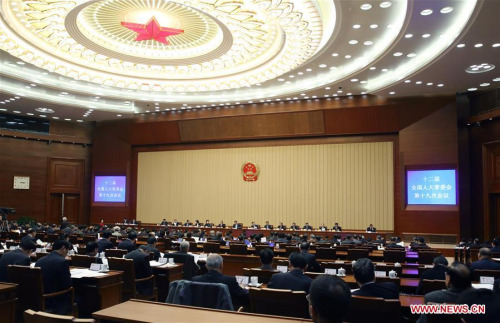 Photo taken on Feb. 24, 2016 shows the scene of the bimonthly session of the Standing Committee of the National People's Congress (NPC) of China, in Beijing, capital of China. Zhang Dejiang, president of the NPC Standing Committee, presides over the opening meeting of the bimonthly session. (Photo: Xinhua/Yao Dawei)