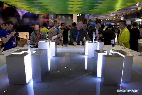 The booth of LG Electronics is seen as its new smartphone, the LG G5, is presented at the Mobile World Congress in Barcelona, Spain, Feb. 23, 2016. (Photo: Xinhua/Lino De Vallier)