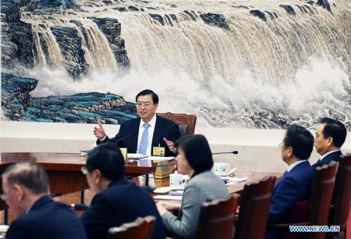 Zhang Dejiang (back), chairman of the Standing Committee of China's National People's Congress (NPC), presides over the 64th chairpersons'meeting of the 12th NPC Standing Committee, in Beijing, capital of China, Feb. 25, 2016. (Photo: Xinhua/Yao Dawei)