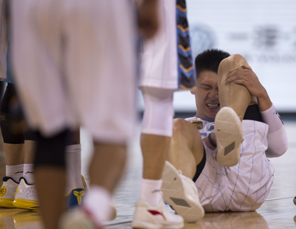 Sun Yue of Beijing Ducks reacts during Game 4 of the quarterfinal series of the China Basketball Association (CBA) playoffs at the MasterCard Center in Beijing February 21, 2016. (Photo/Xinhua)