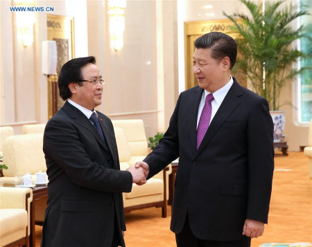 Chinese President Xi Jinping (R), who is also general secretary of the Communist Party of China (CPC) Central Committee, meets with Communist Party of Vietnam (CPV) international department chief Hoang Binh Quan, the special envoy of Vietnam's communist party chief Nguyen Phu Trong, in Beijing, capital of China, Feb. 29, 2016. (Photo: Xinhua/Pang Xinglei)