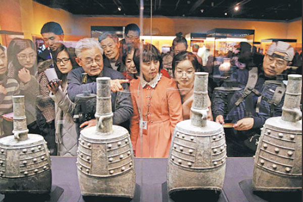 A set of ancient chime bells is displayed at the Capital Museum in Beijing on Wednesday. (Photo by Jiang Dong / China Daily)