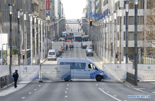 The avenue in front of the blast-hit Maalbeek railway station is blocked by police for investigation in Brussels, capital of Belgium, March 22, 2016. The death toll has risen to 34 in the deadly blasts in Brussels on Tuesday morning, according to the latest figures. (Xinhua/Ye Pingfan)