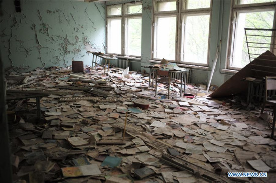 hoto taken on April 19, 2016 shows a deserted school in Pripyat city near Chernobyl, Ukraine. Chernobyl, a place replete with horrific memories in northern Ukraine, close to Belarus, is now open to tourists, almost 30 years to the date after a nuclear power plant there exploded. (Photo: Xinhua/Dai Tianfang)