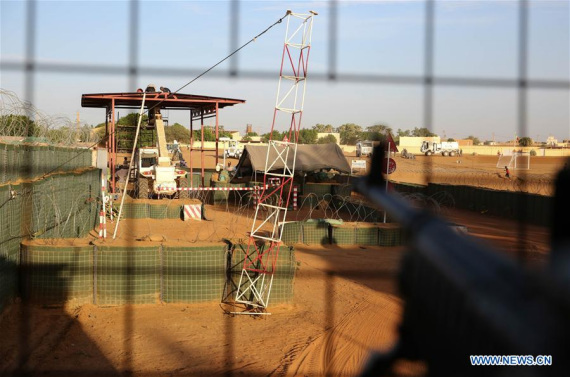 File photo taken on Oct. 28, 2015 shows an entrance of the United Nations Multidimensional Integrated Stabilization Mission in Mali (MINUSMA) camp in Gao.   (Xinhua/Pan Siwei)