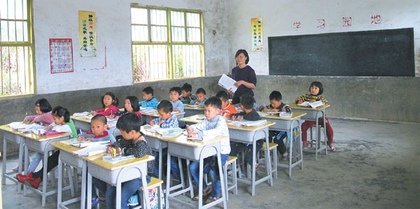 Students study at Huichang Zhulan Demonstration School's primary school. (Photos Provided To China Daily)