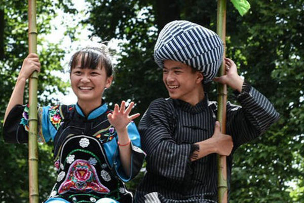 Villagers of Miao ethic group celebrate the traditional festival on the sixth day of sixth month of Chinese lunar calendar in Jiulong village of Songtao Miao Ethic autonomous county, Southwest China's Guizhou province, July 9, 2016. (Photo/Xinhua)