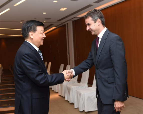 Liu Yunshan (L), a member of the Standing Committee of the Political Bureau of the Central Committee of the Communist Party of China, meets with Kyriakos Mitsotakis, leader of the main opposition New Democracy (ND) party in Athens, Greece, Oct. 5, 2016. (Xinhua/Rao Aimin)