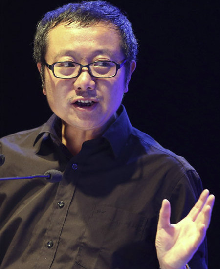 Liu Cixin, who attended an event in Beijing last month, shows up at the Frankfurt Book Fair with a German version of Three-Body Problem that will be released soon. (Photo by Wang Zhuangfei/China Daily)