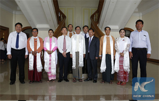 Deputy Speaker of Myanmar's House of Nationalities U Aye Tha Aung (C, front) poses for a group photo with head of the delegation Penba Tashi (4th R, front), who is also Vice Chairman of the Government of the Tibet Autonomous Region, in Nay Pyi Taw, Myanmar, Nov. 7, 2016. (Photo/Xinhua)