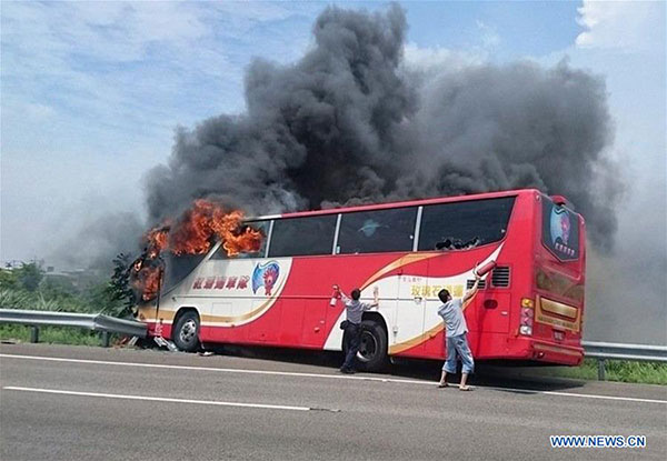 Photo taken on July 19, 2016 shows the accident site of a coach fire in Taipei, China's Taiwan. (Photo/Xinhua)