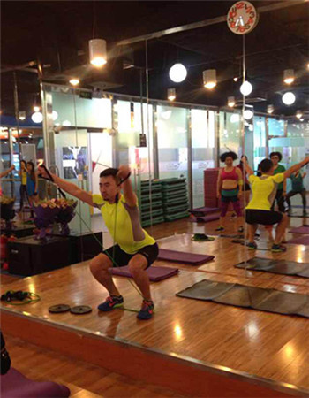 Shao Xiaofeng, a senior fitness instructor at a Beijing gym.