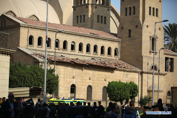 People gather at the explosion site in Cairo, Egypt on Dec. 11, 2016. At least 25 people were killed and 49 others injured on Sunday in an explosion at the Coptic Cathedral in Abbasiya's neighborhood of Cairo, Egypt's Ministry of Health said in a statement. (Xinhua/Ahmed Gomaa)