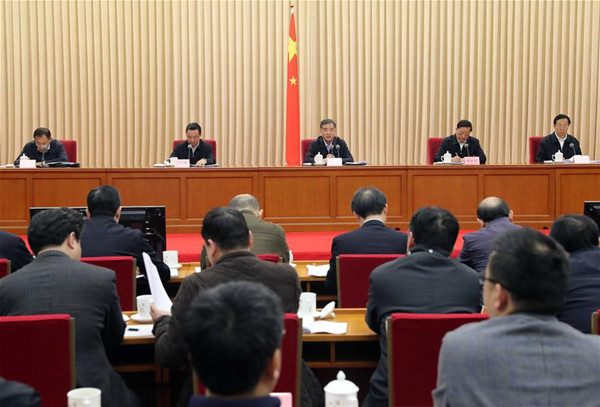 Chinese Vice Premier Wang Yang (C, back) attends a national teleconference on improving the working and living conditions in the rural areas, in Beijing, capital of China, Dec. 13, 2016. (Xinhua/Liu Weibing)