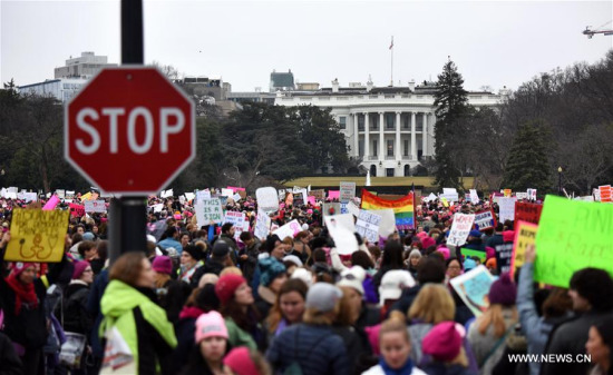 People participate in the Women's March protesting Trump's presidency following the inauguration of U.S. President Donald Trump, in Washington D.C., the United States, Jan. 21, 2017. (Xinhua/Yin Bogu)