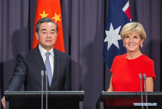 Chinese Foreign Minister Wang Yi (L) and his Australian counterpart Julie Bishop meet the press after the two countries' fourth round of diplomatic and strategic dialogue in Canberra, Australia, Feb. 7, 2017. Foreign ministers of China and Australia called for further strengthening of bilateral ties here on Tuesday. (Xinhua/Zhu Hongye)