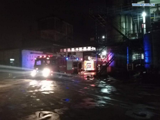 Fire fighting vehicles are seen at the accident site in Tongling, east China's Anhui Province, Feb. 8, 2017. (Xinhua)