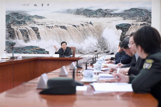 Zhang Dejiang (L), chairman of the Standing Committee of the National People's Congress (NPC), speaks while presiding over a seminar on the annual NPC Standing Committee report for deputies in Beijing, held in Beijing, capital of China, Feb. 8, 2017. (Xinhua/Zhang Duo)