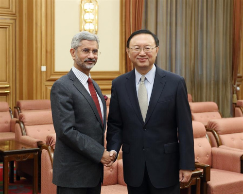 Chinese State Councilor Yang Jiechi (R) shakes hands with Indian Foreign Secretary Subramanyam Jaishankar during their meeting in Beijing, capital of China, Feb. 21, 2017. (Xinhua/Wang Ye)