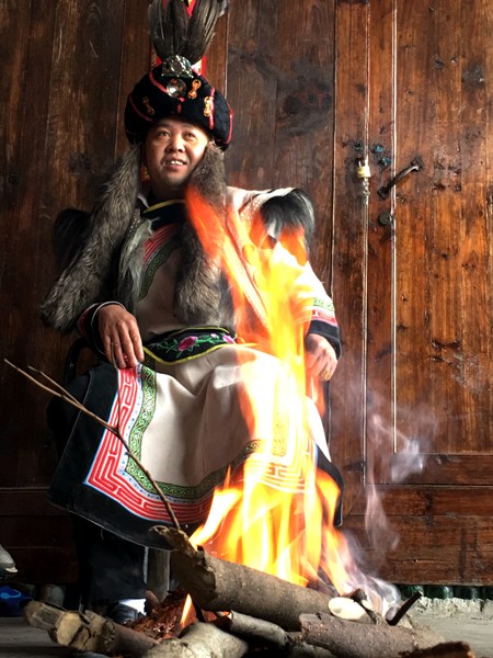 Hu Zhengyong, head of Qishuping village. (Photo by Yang Jun/China Daily)