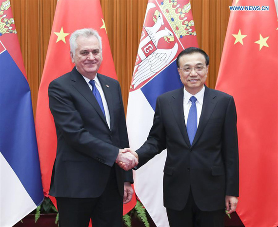 Chinese Premier Li Keqiang (R) meets with visiting Serbian President Tomislav Nikolic in Beijing, capital of China, March 31, 2017. (Xinhua/Pang Xinglei)