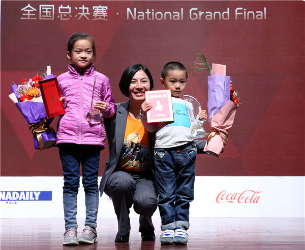 VIPKid co-founder Chen Yuan (center) with Wu Chenhe (left) and Huang Xingyun, at the 1st China Daily 21st Century National Kids English Competition. (Photo by Zou Hong/China Daily)