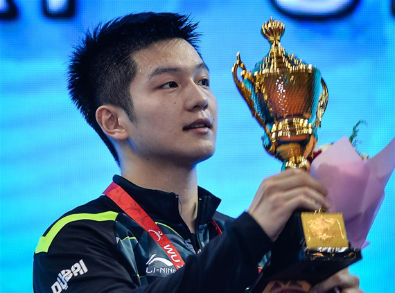 Winner China's Fan Zhendong celebrates with his trophy during the awarding ceremony for the men's singles event at the 23rd ITTF Asian Table Tennis championships in Wuxi, east China's Jiangsu Province, April 16, 2017. (Xinhua/Li Xiang)