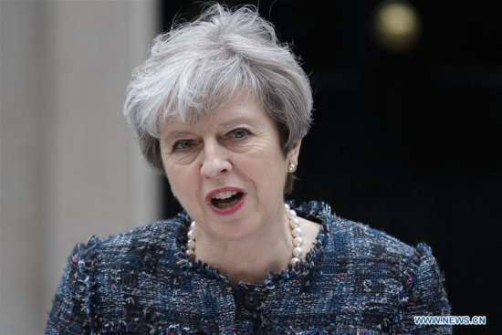 British Prime Minister Theresa May makes a statement at 10 Downing Street after returning from Buckingham Palace where she met Britain's Queen Elizabeth II to ask permission for the dissolution of Parliament, in London, Britain on May 3, 2017. (Xinhua/Tim Ireland)