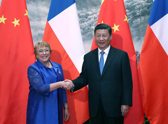 Chinese President Xi Jinping (R) holds talks with Chilean President Michelle Bachelet at the Great Hall of the People in Beijing, capital of China, May 13, 2017. (Xinhua/Ju Peng)