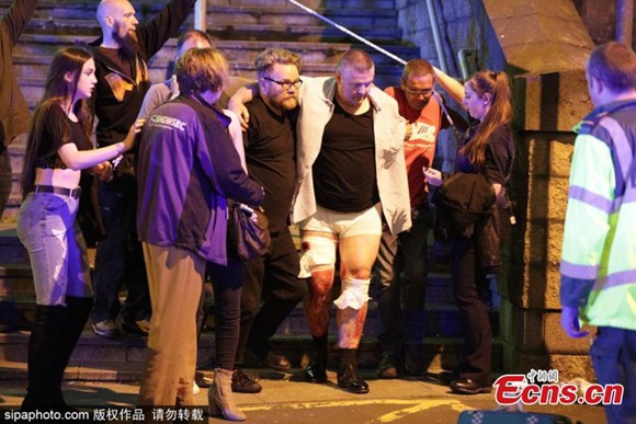 At least 22 people have been confirmed dead, with around 50 others injured in an explosion at Manchester Arena on May 22 in Manchester, England, where pop singer Ariana Grande was performing.(Photo/Sipachina)