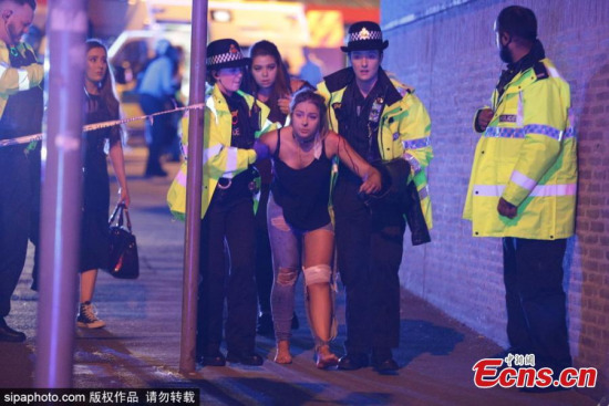 At least 19 people have been confirmed dead, with around 50 others injured in an explosion at Manchester Arena on May 22 in Manchester, England, where pop singer Ariana Grande was performing. (Photo/Sipachina)