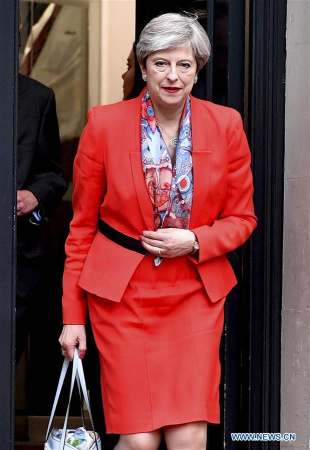 British Prime Minister Theresa May leaves Conservative Central Office in central London, Britain on June 9, 2017.(Xinhua/File photo)