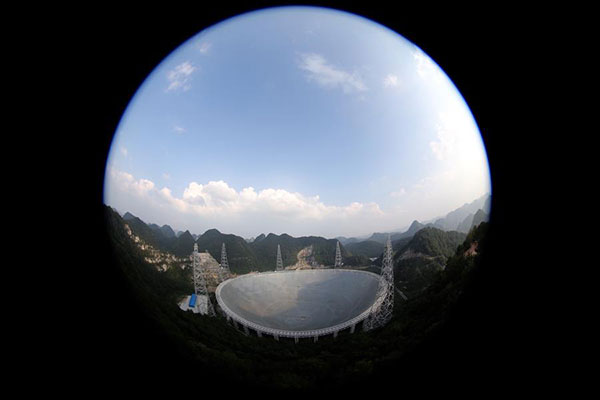 This scene taken from FAST's viewing platform shows the panorama of the 500-meter Aperture Spherical Telescope in Pingtang county, Guizhou province, Sept 24, 2016. (Photo/Xinhua)