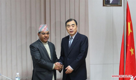 Chinese Assistant Foreign Minister Kong Xuanyou (R) shakes hands with Nepal's Foreign Secretary Shanker DAS Bairagi before the 11th meeting of Nepal-China Joint Consultation Mechanism held at the office of Foreign Ministry at Singhadurbar in Kathmandu, Nepal, June 20, 2017. (Xinhua/Sunil Sharma)